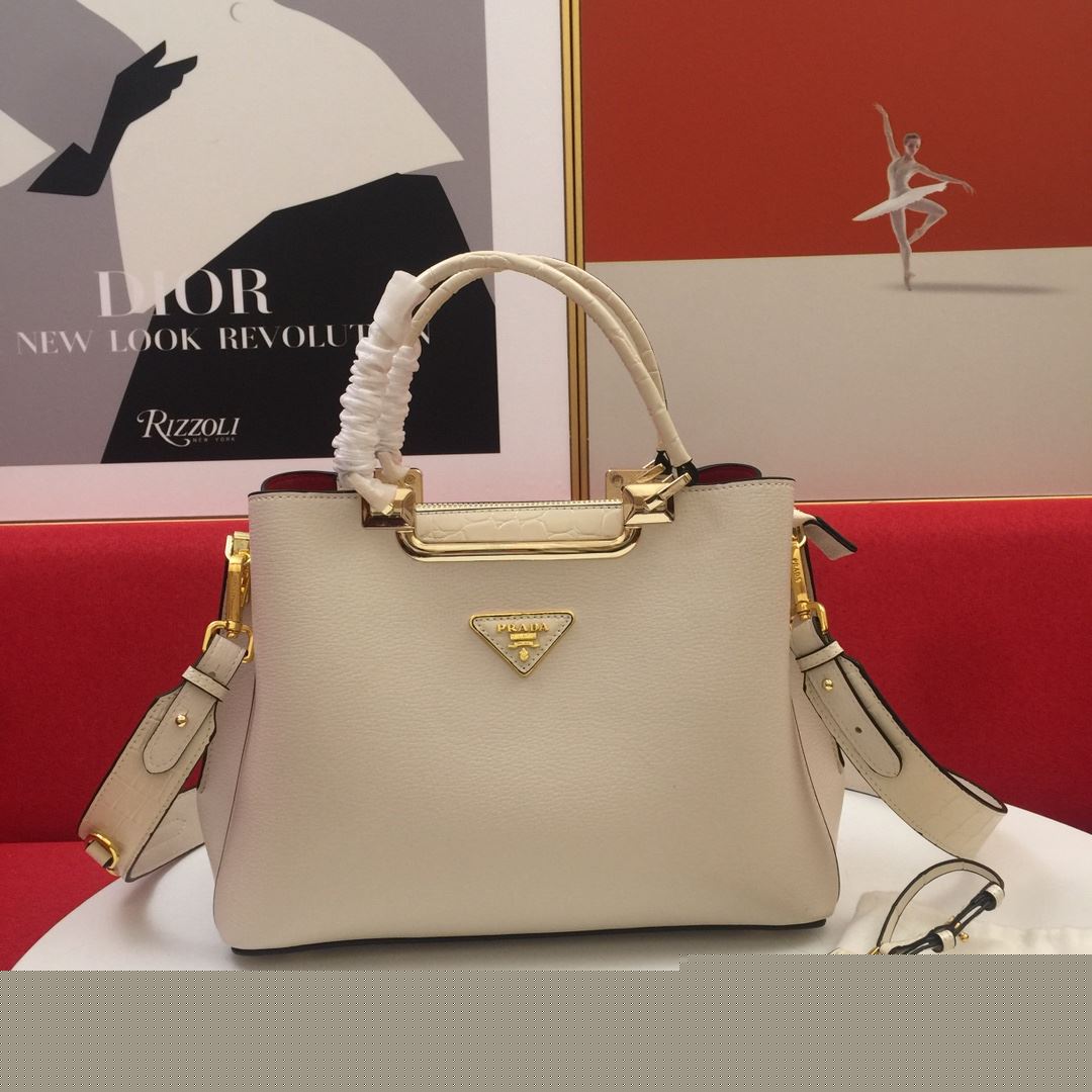 Pra*a top handle bags